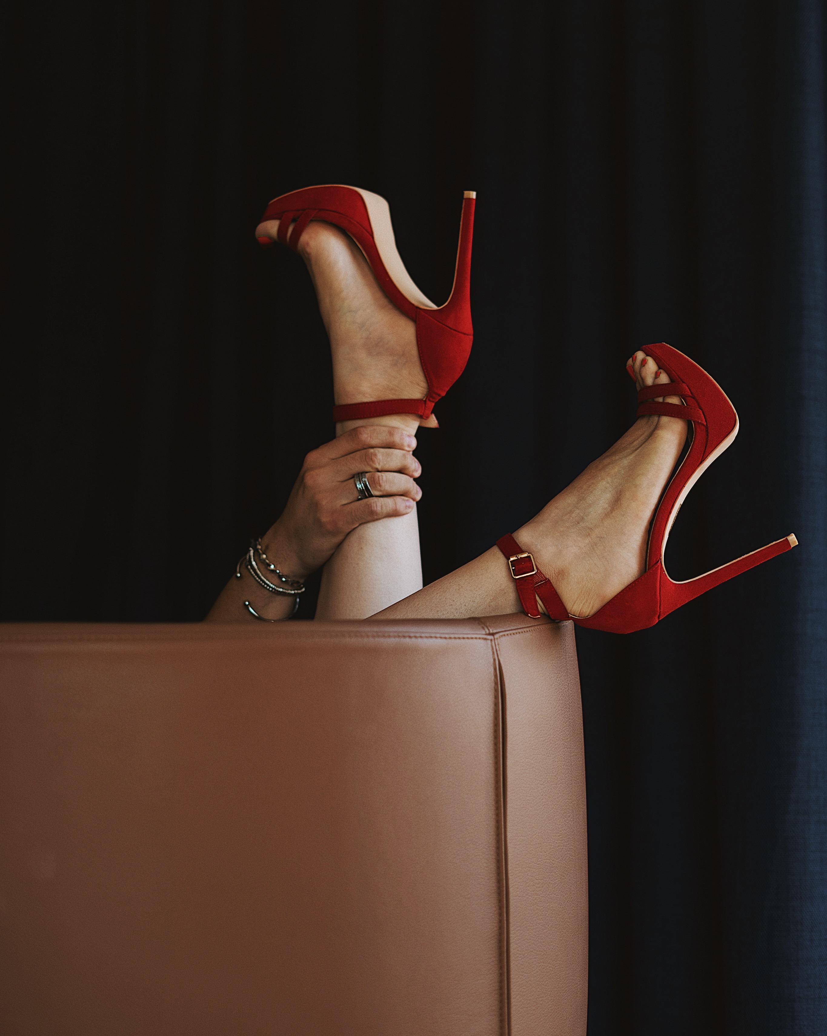 Gatsby Athens Hotel Bagian luar foto A woman wearing red high-heeled shoes