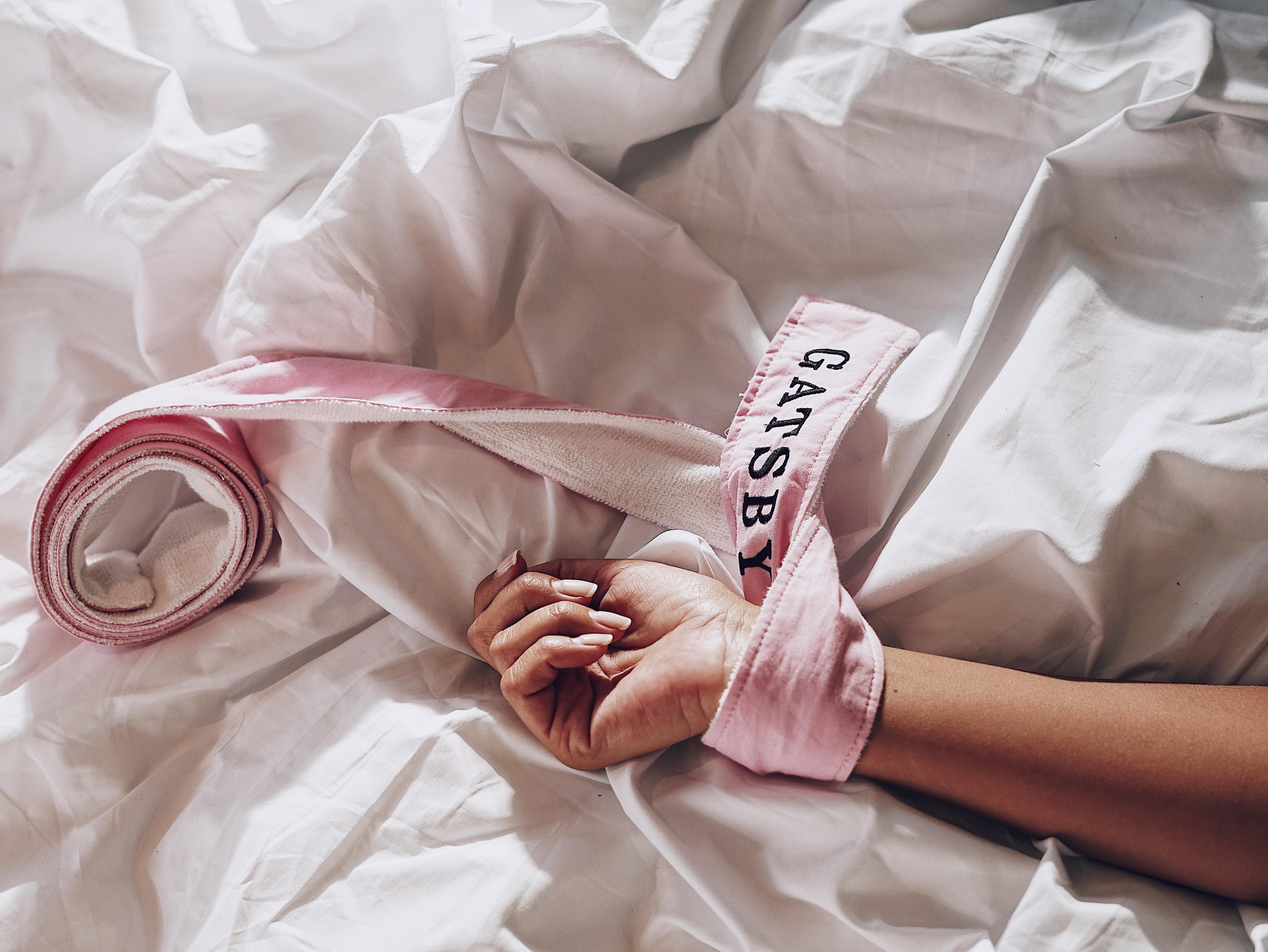 Gatsby Athens Hotel Bagian luar foto A woman with her hands tied